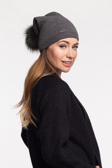 Elegant women's hat with fake fur pompom
