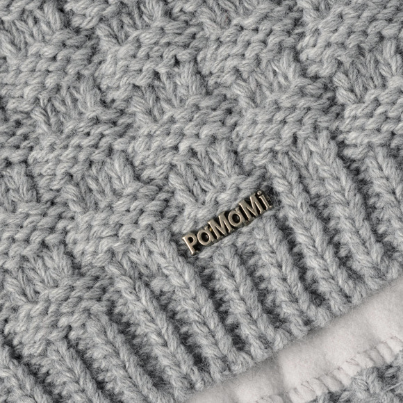 Warm women’s winter hat with pompom